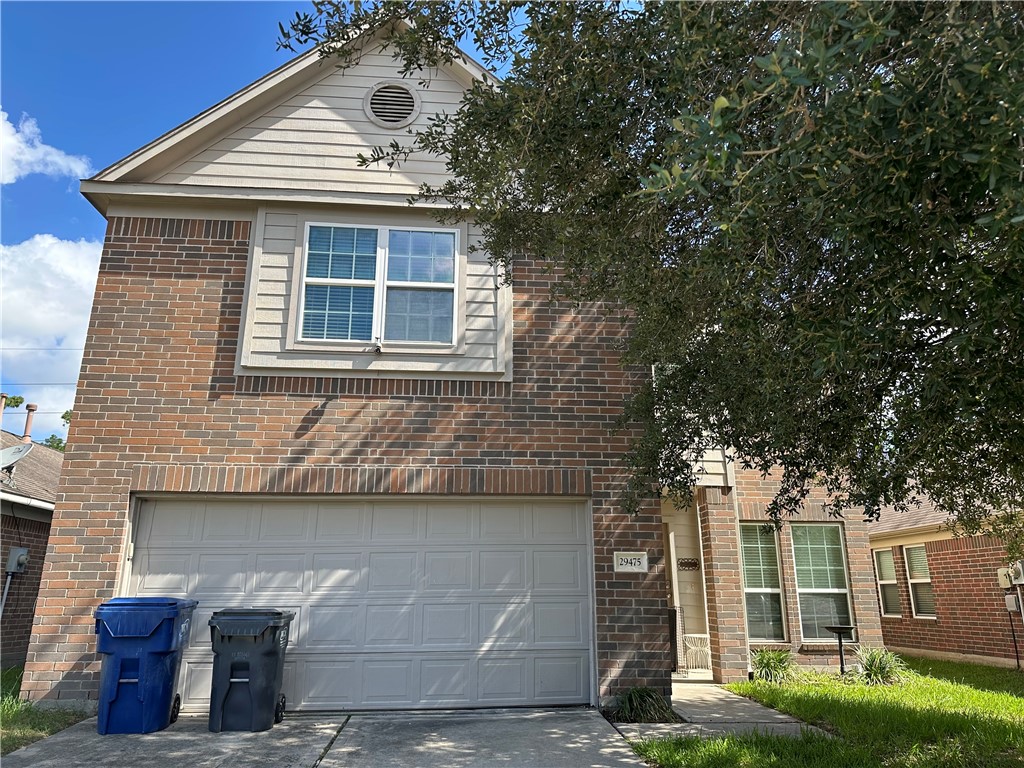 29475 Forest Spring Spring, TX 77373 - Photo 2 of 10 a front view of a house with a yard