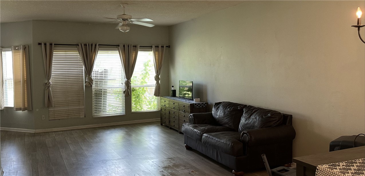 29475 Forest Spring Spring, TX 77373 - Photo 3 of 10 a living room with furniture and a window