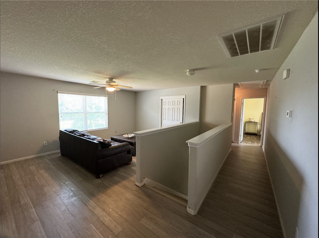 29475 Forest Spring Spring, TX 77373 - Photo 5 of 10 a living room with furniture and a wooden floor