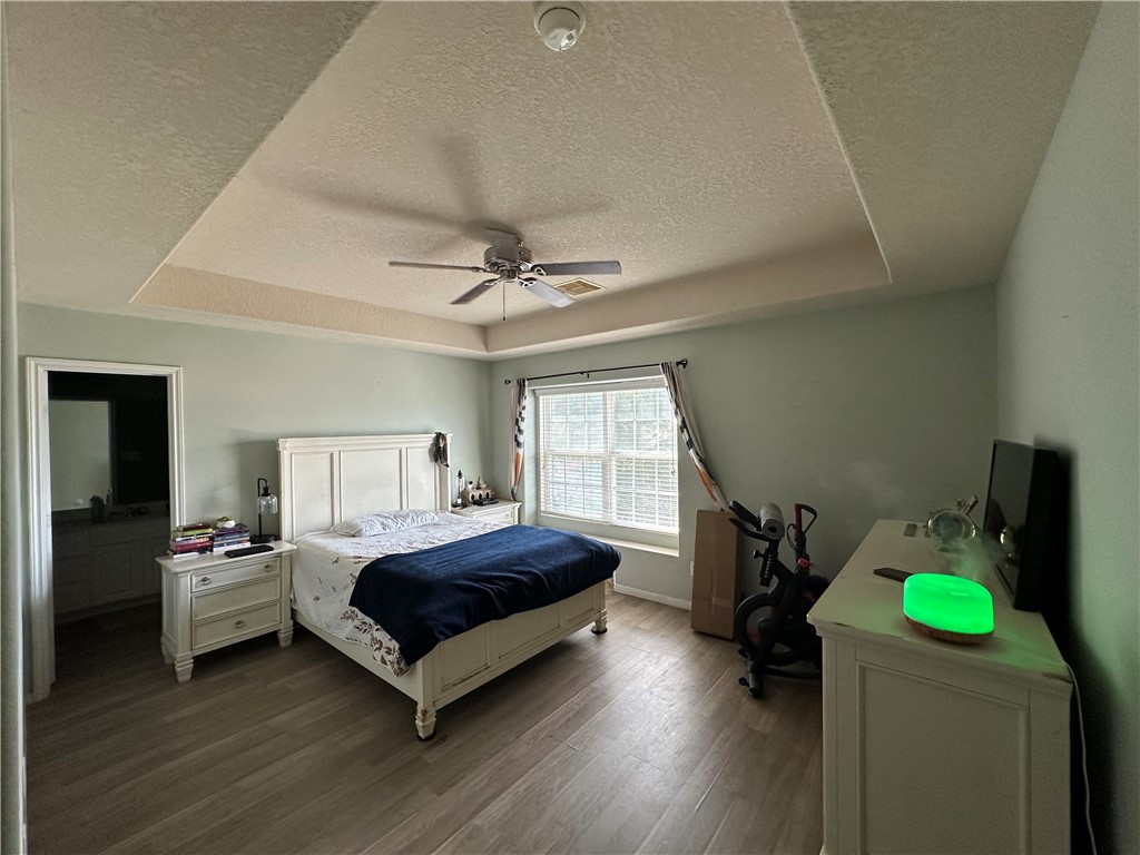 29475 Forest Spring Spring, TX 77373 - Photo 6 of 10 a bedroom with a bed and a view of bedroom