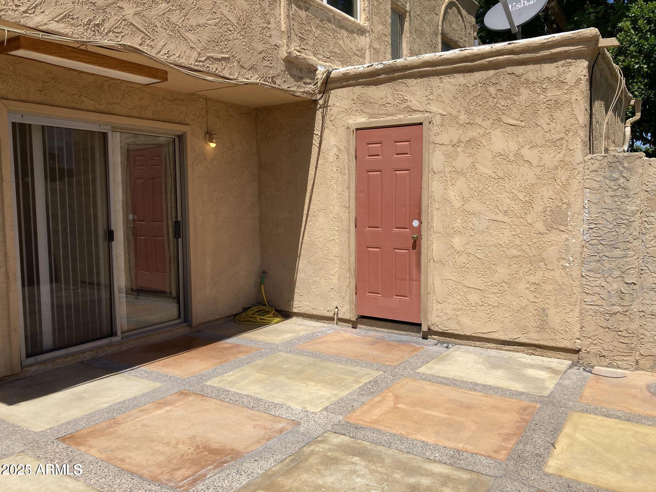 948 South Alma School Road, Unit 102 Mesa, AZ 85210 - Photo 4 of 13 a view of a door of the house
