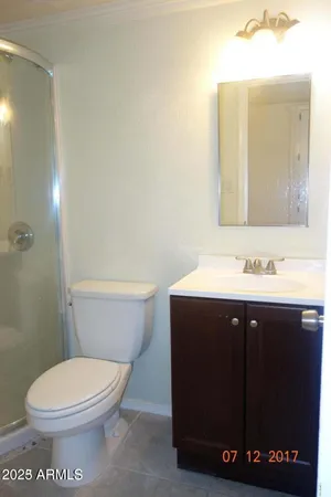 a bathroom with a sink and a toilet