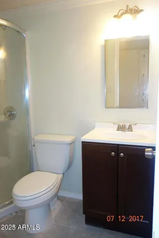 a bathroom with a sink and a toilet