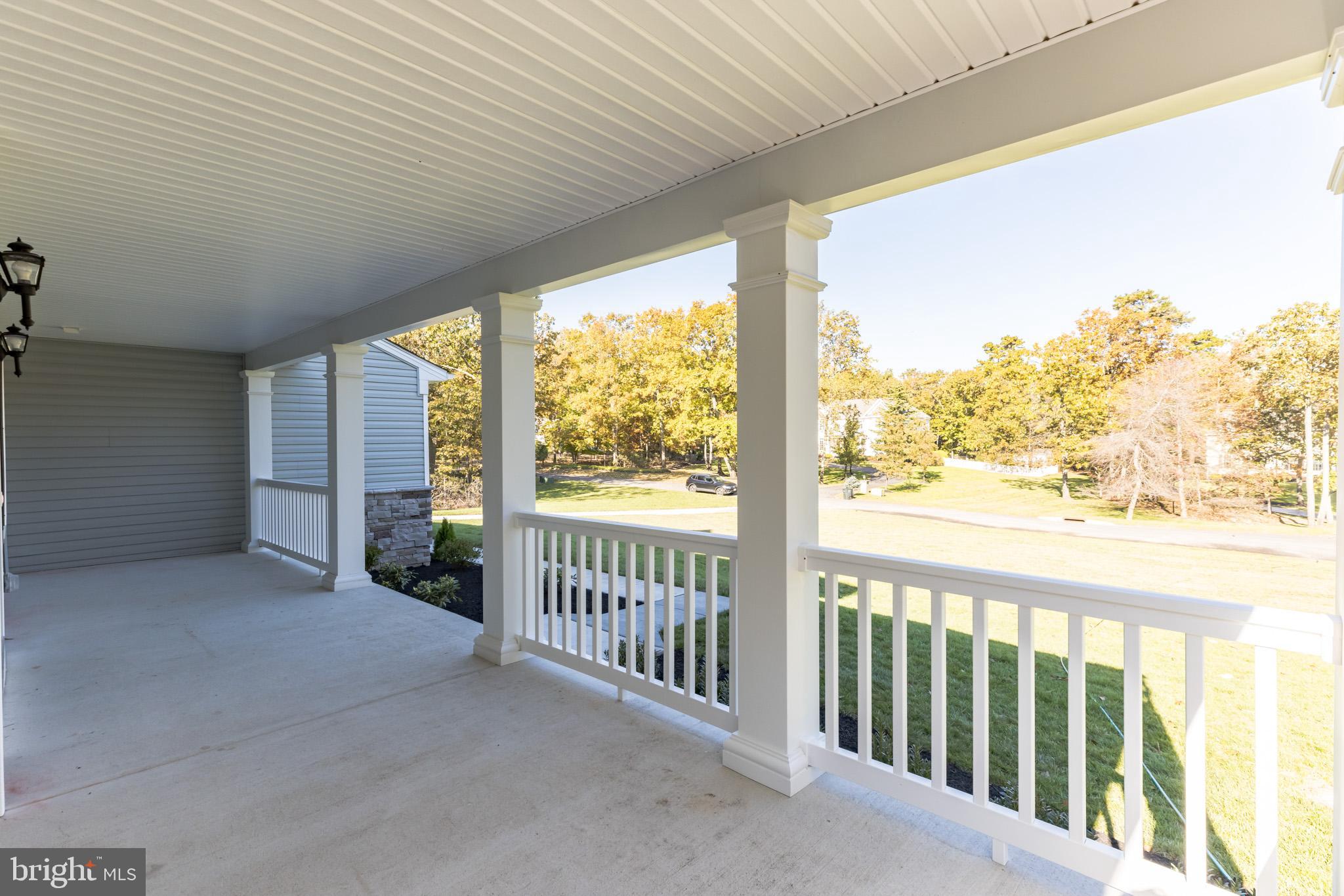 317 Ferrell Road Mullica Hill, NJ 08062 - Photo 2 of 31 a view of a porch with wooden floor of the house