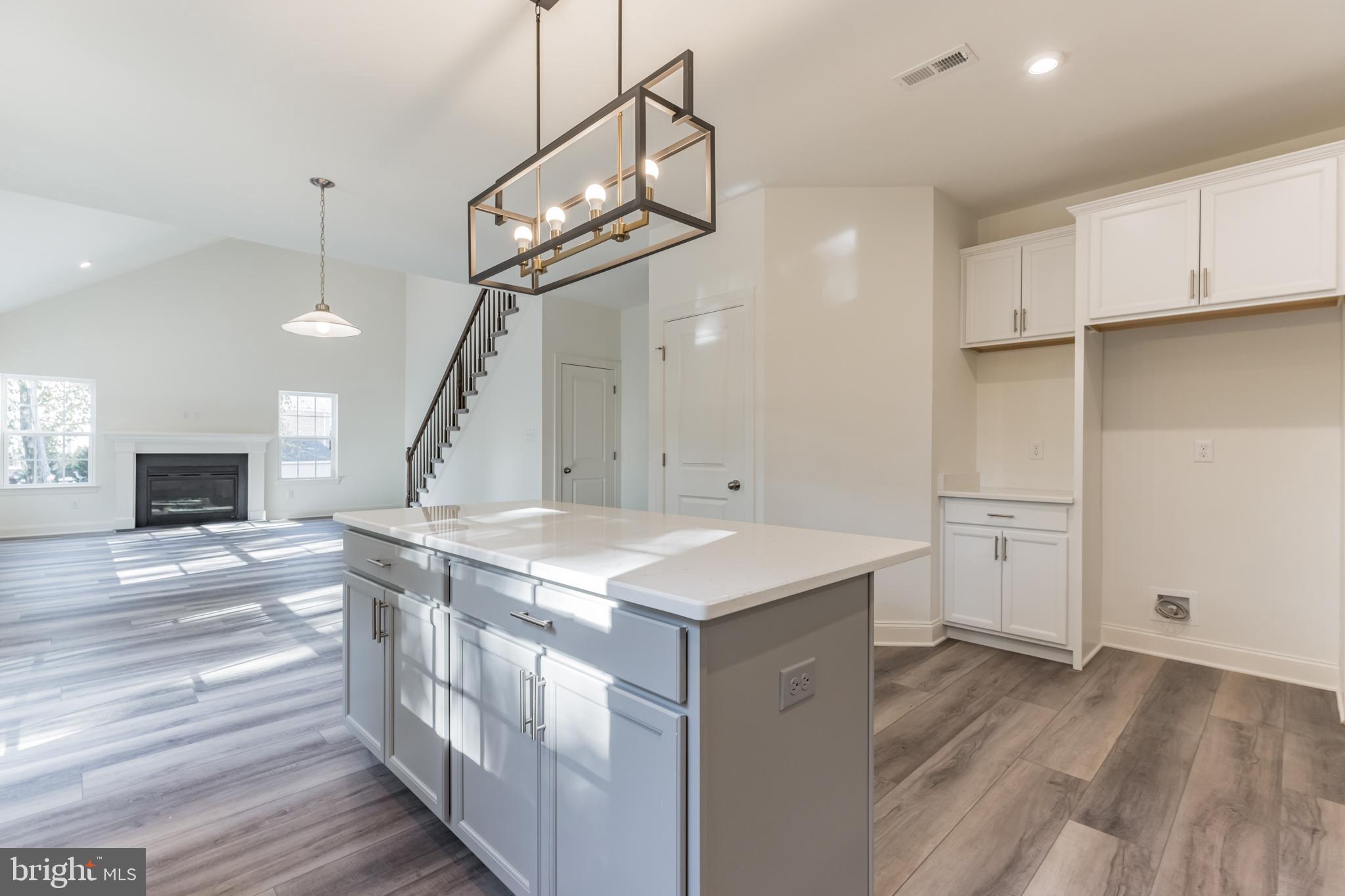 317 Ferrell Road Mullica Hill, NJ 08062 - Photo 13 of 31 a kitchen that has a lot of cabinets in it