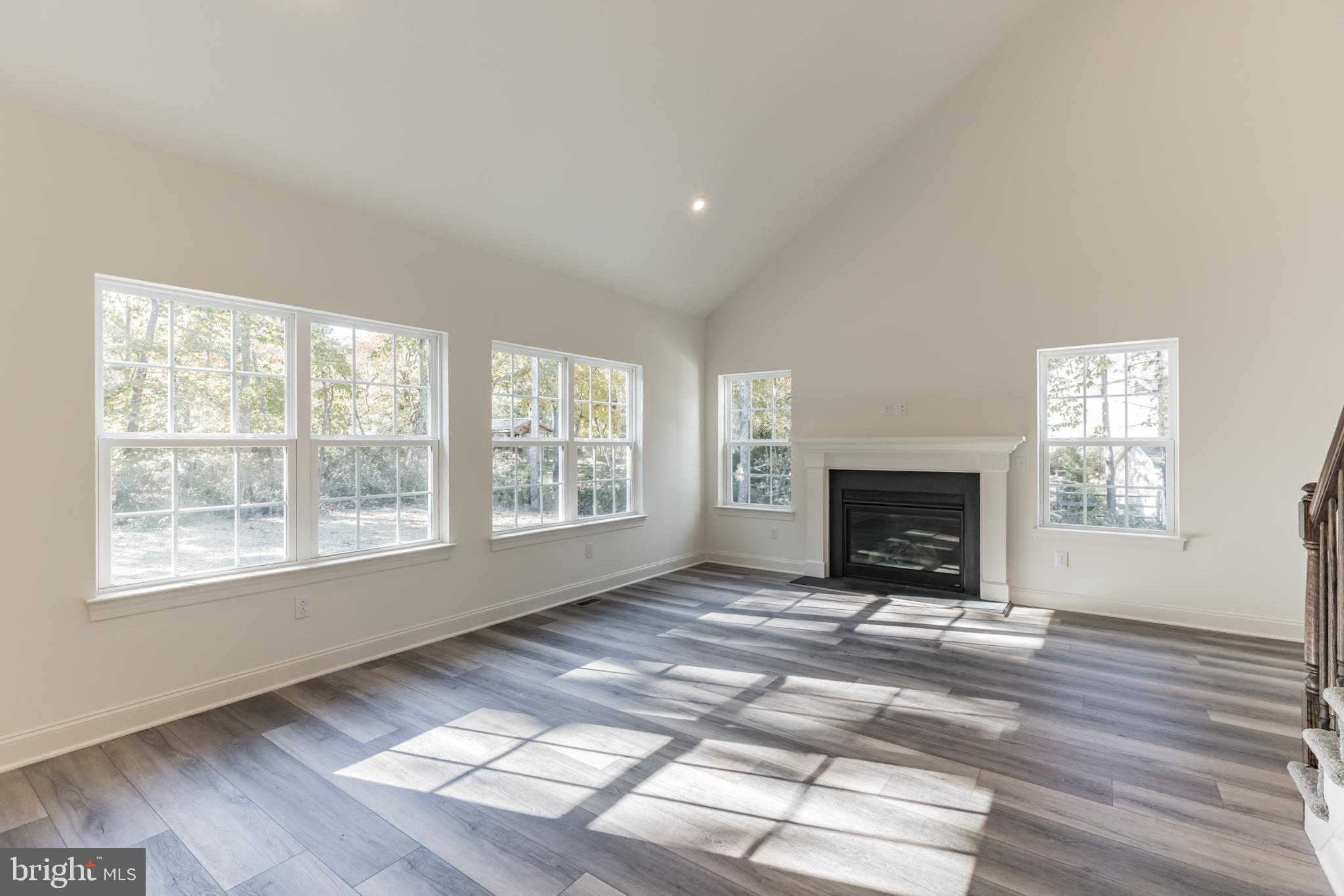 317 Ferrell Road Mullica Hill, NJ 08062 - Photo 15 of 31 a view of an empty room with a window and fireplace