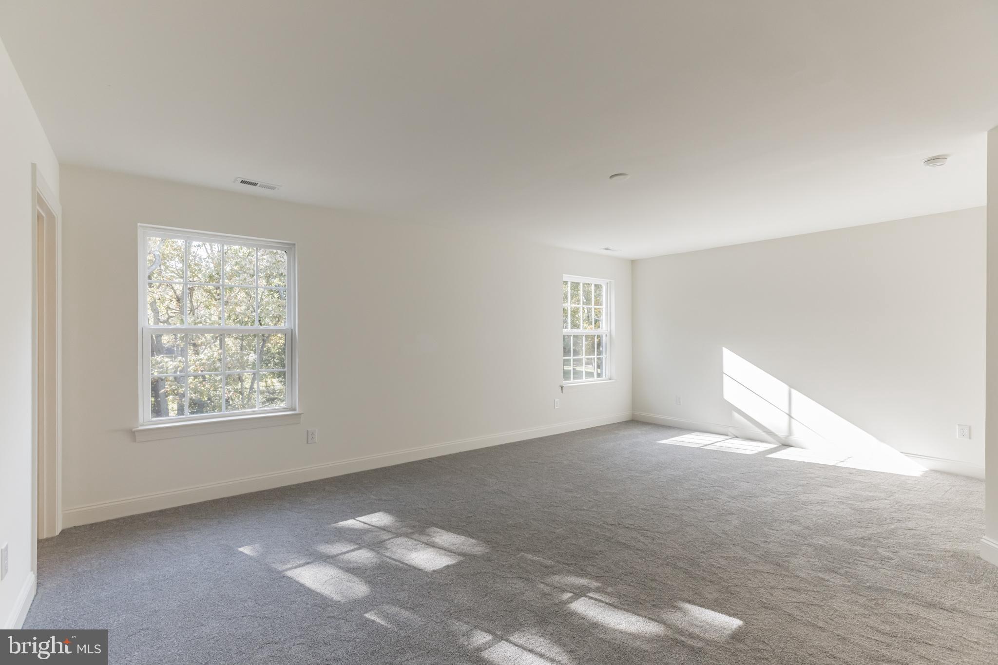 317 Ferrell Road Mullica Hill, NJ 08062 - Photo 19 of 31 a view of an empty room with a window