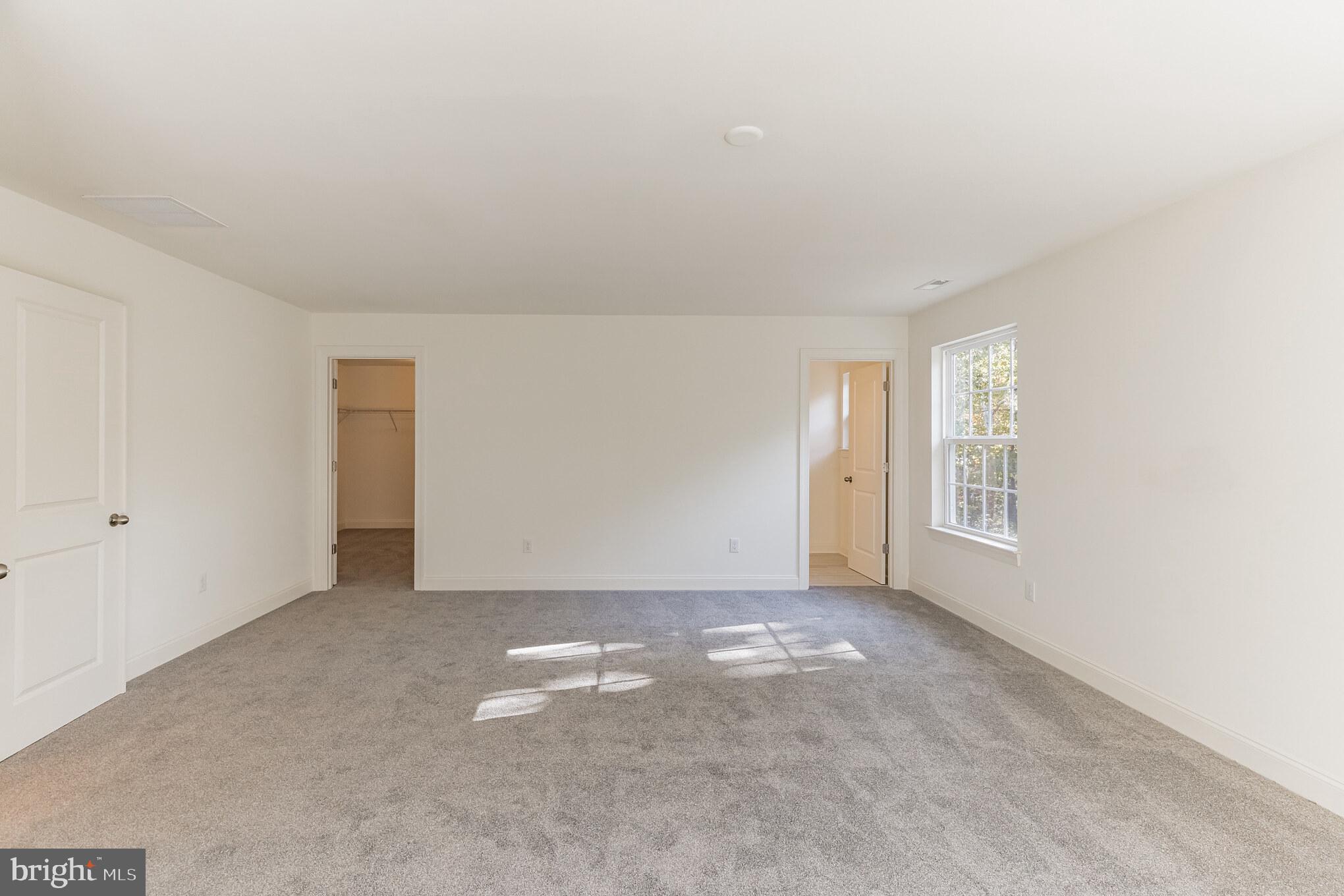 317 Ferrell Road Mullica Hill, NJ 08062 - Photo 20 of 31 an empty room with windows