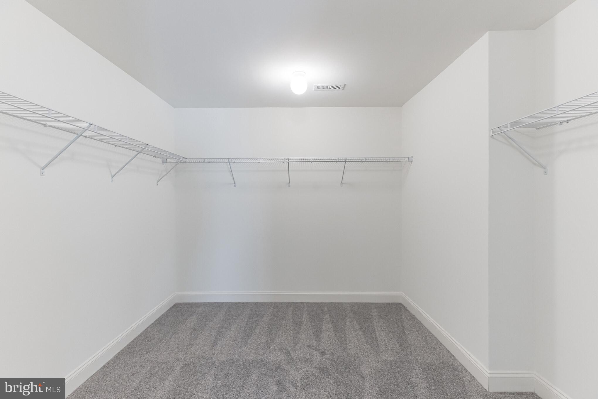317 Ferrell Road Mullica Hill, NJ 08062 - Photo 23 of 31 a view of a room with racks on the wall