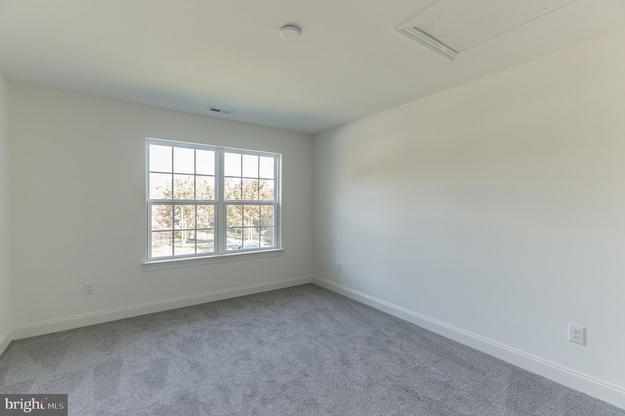 317 Ferrell Road Mullica Hill, NJ 08062 - Photo 24 of 31 an empty room with a window
