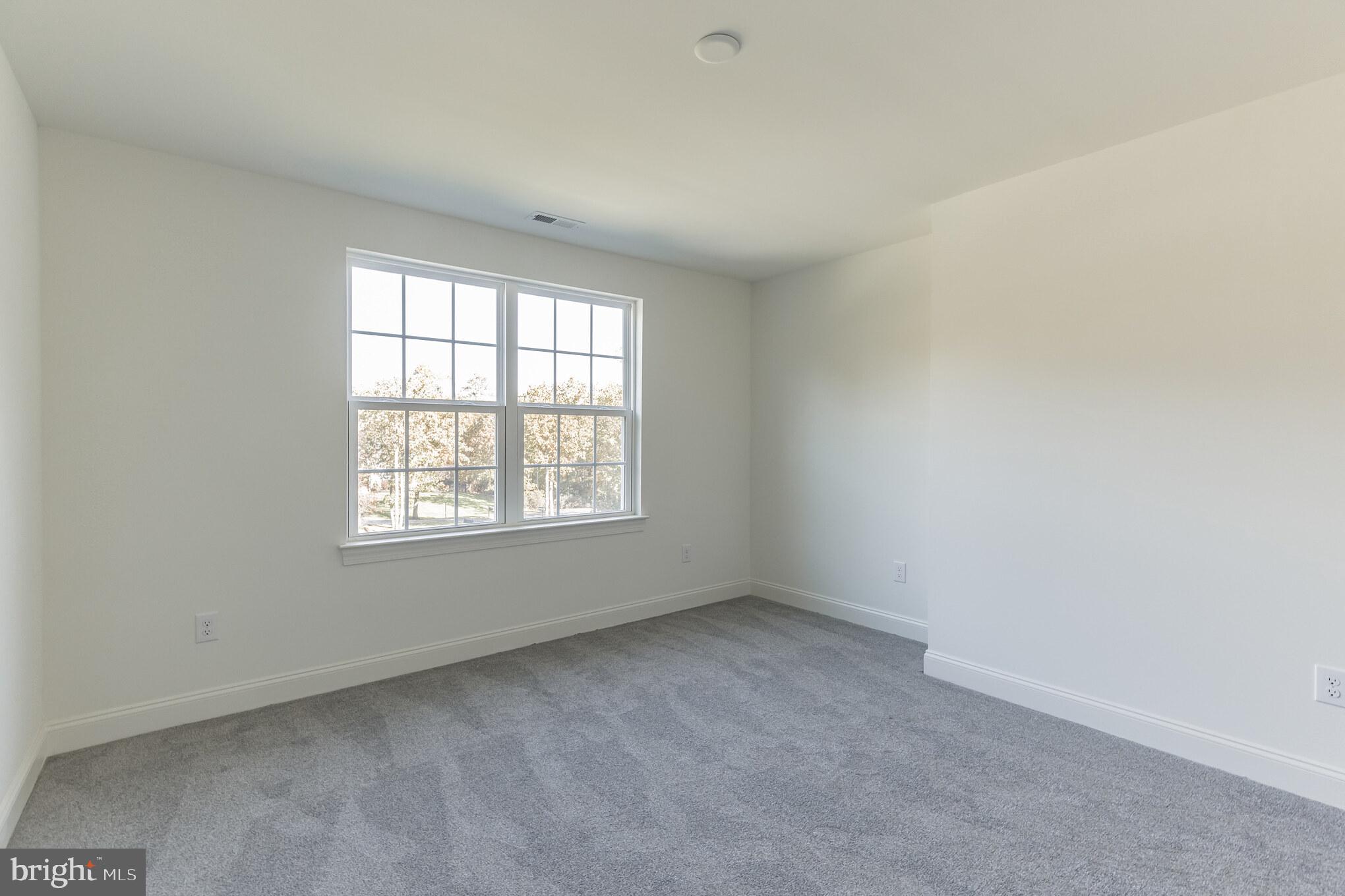 317 Ferrell Road Mullica Hill, NJ 08062 - Photo 25 of 31 an empty room with a window