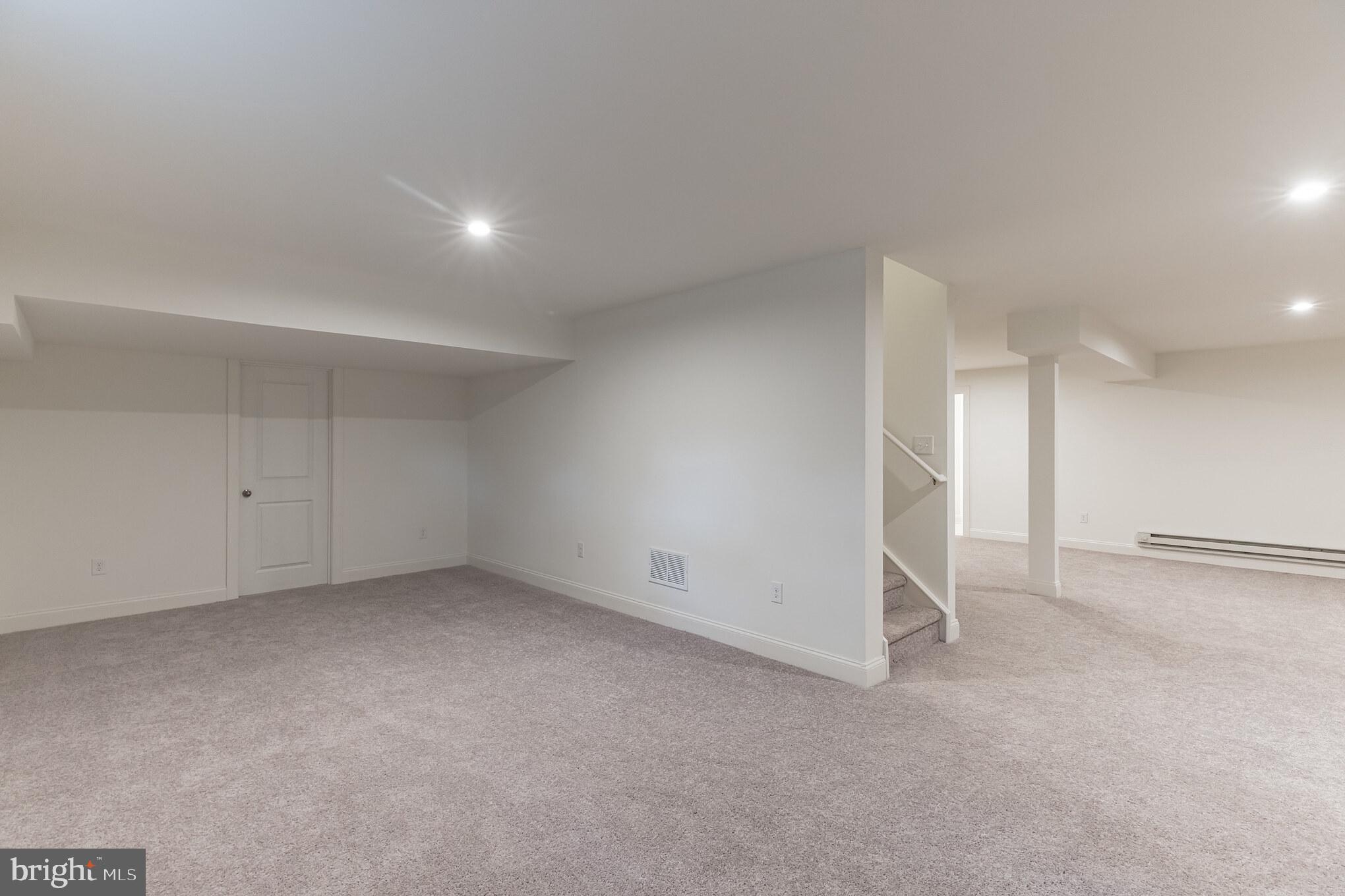 317 Ferrell Road Mullica Hill, NJ 08062 - Photo 28 of 31 an empty room with a natural light