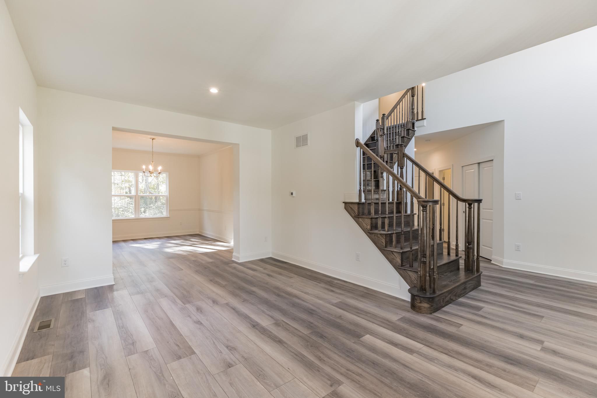 317 Ferrell Road Mullica Hill, NJ 08062 - Photo 5 of 31 a view of entryway with wooden floor