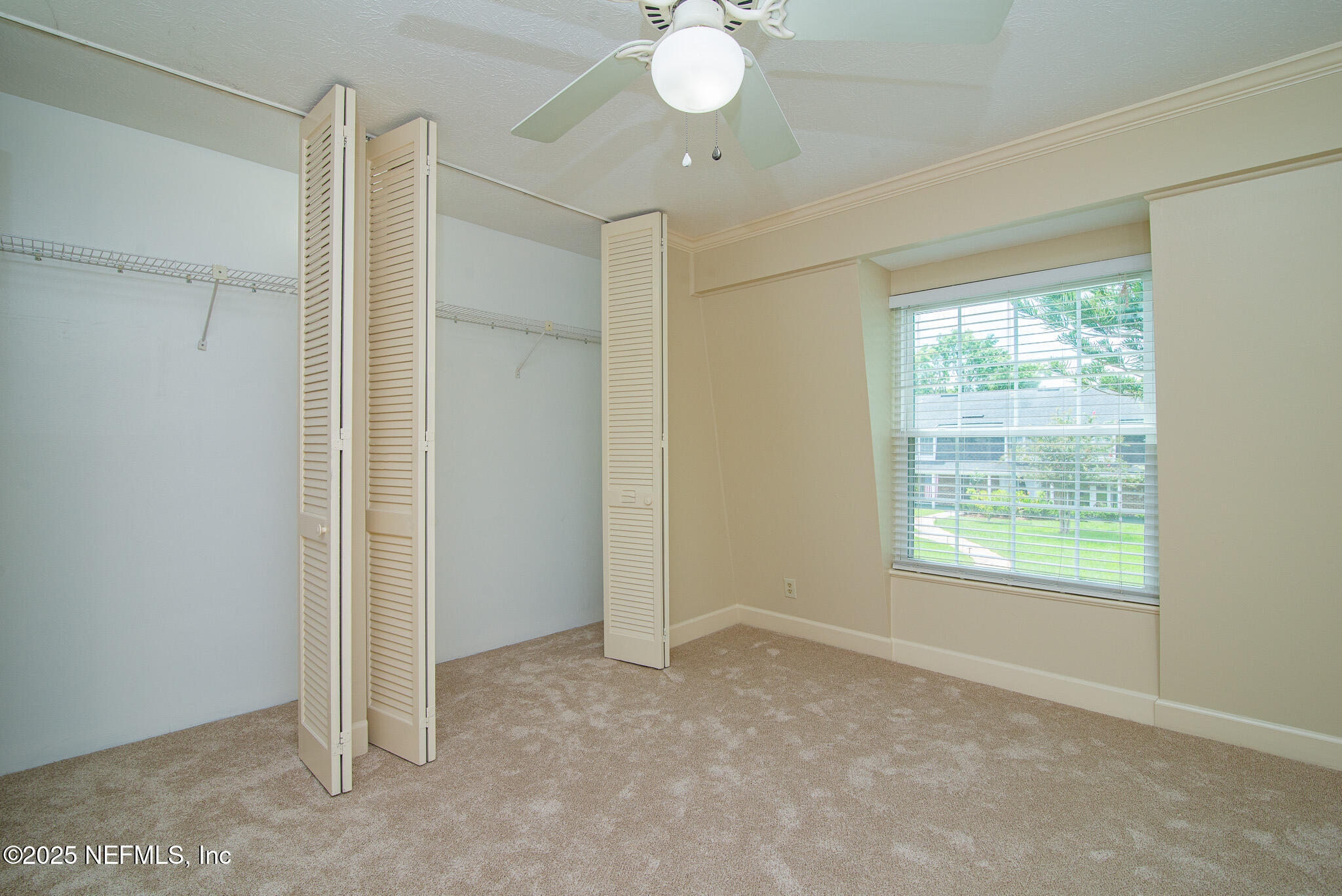 4358 Timuquana Road, Unit 148 Jacksonville, FL 32210 - Photo 11 of 22 a view of an empty room with a window
