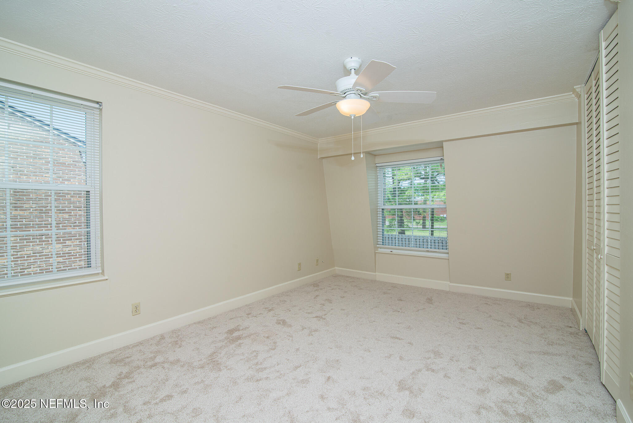 4358 Timuquana Road, Unit 148 Jacksonville, FL 32210 - Photo 12 of 22 an empty room with a window