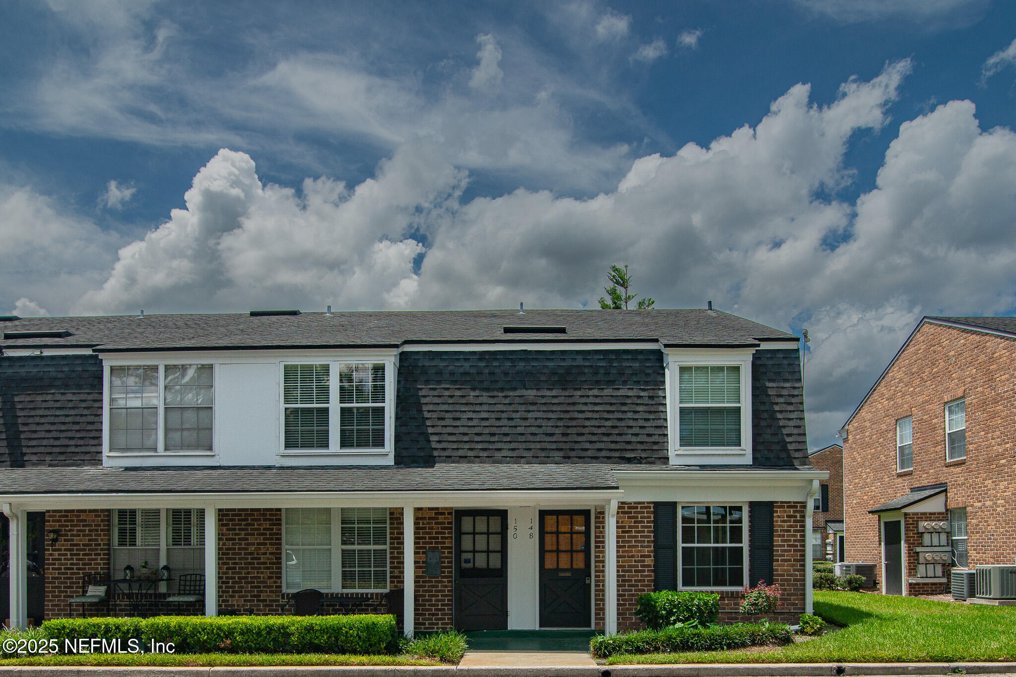 4358 Timuquana Road, Unit 148 Jacksonville, FL 32210 - Photo 18 of 22 a front view of a house with garden