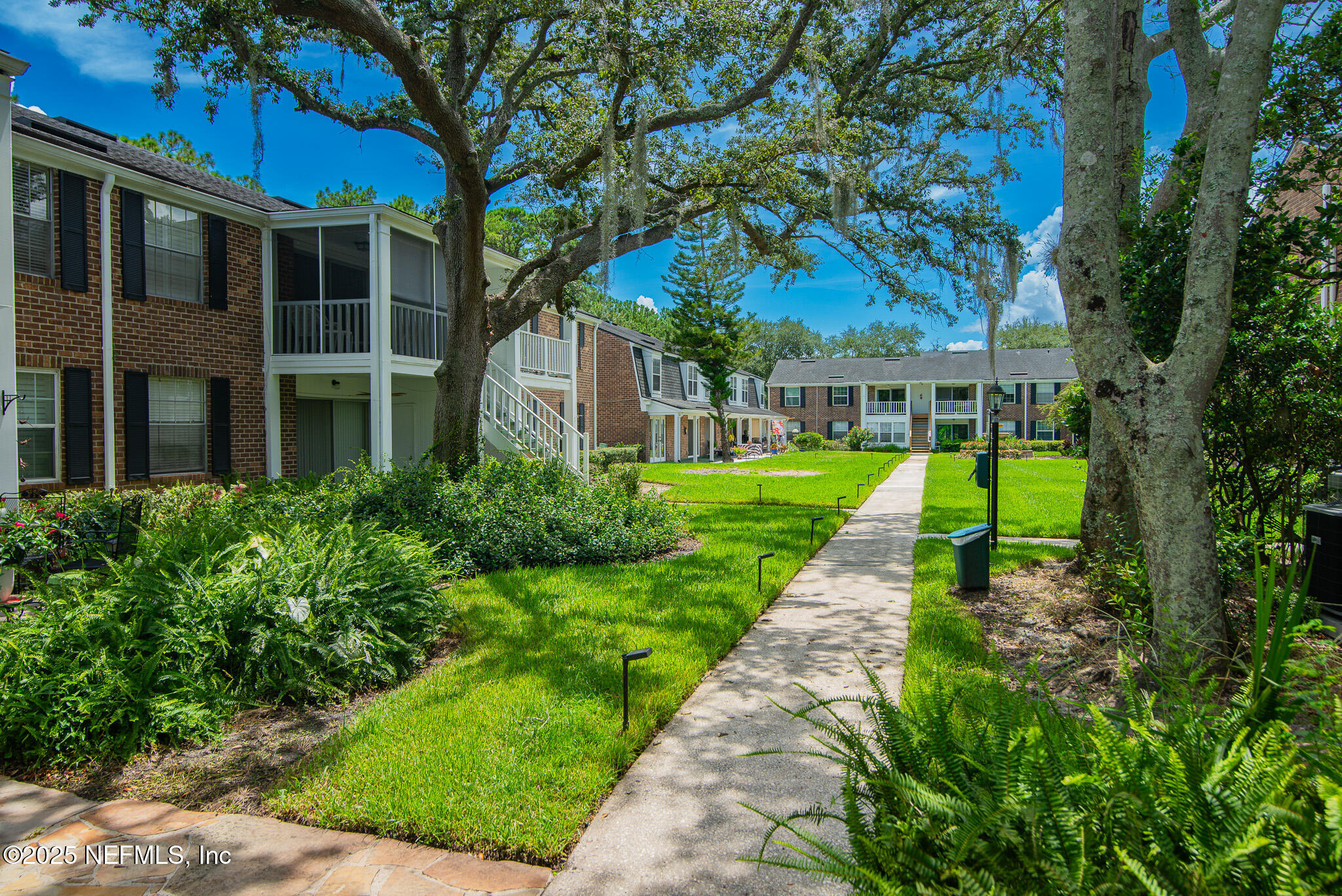 4358 Timuquana Road, Unit 148 Jacksonville, FL 32210 - Photo 21 of 22 a front view of a house with a yard