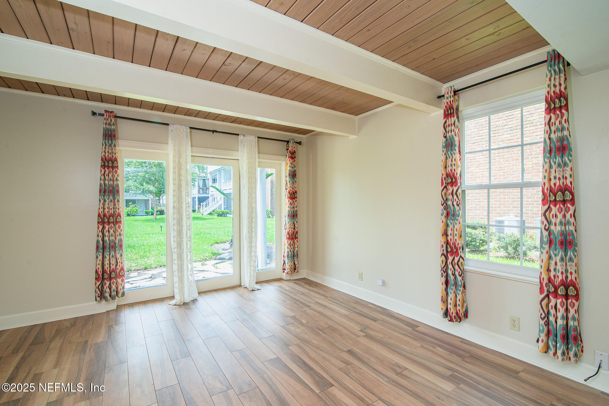4358 Timuquana Road, Unit 148 Jacksonville, FL 32210 - Photo 8 of 22 a view of an entryway with wooden floor