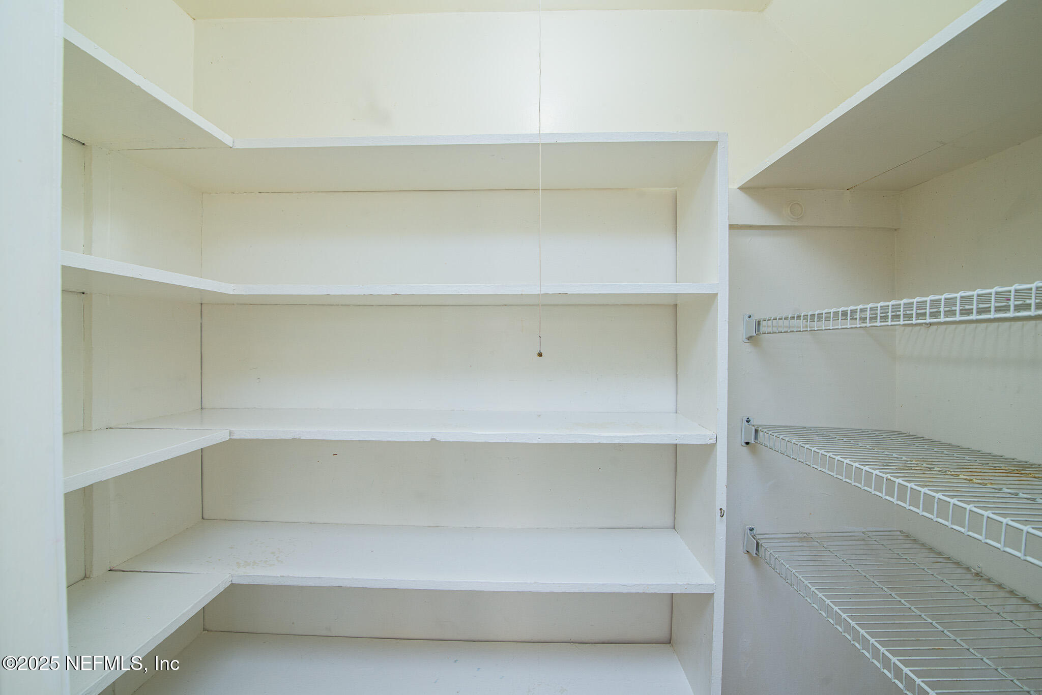 4358 Timuquana Road, Unit 148 Jacksonville, FL 32210 - Photo 9 of 22 a view of an empty walk in closet
