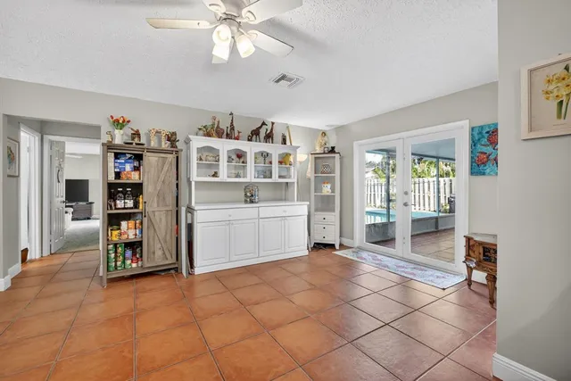 a view of kitchen with furniture and window