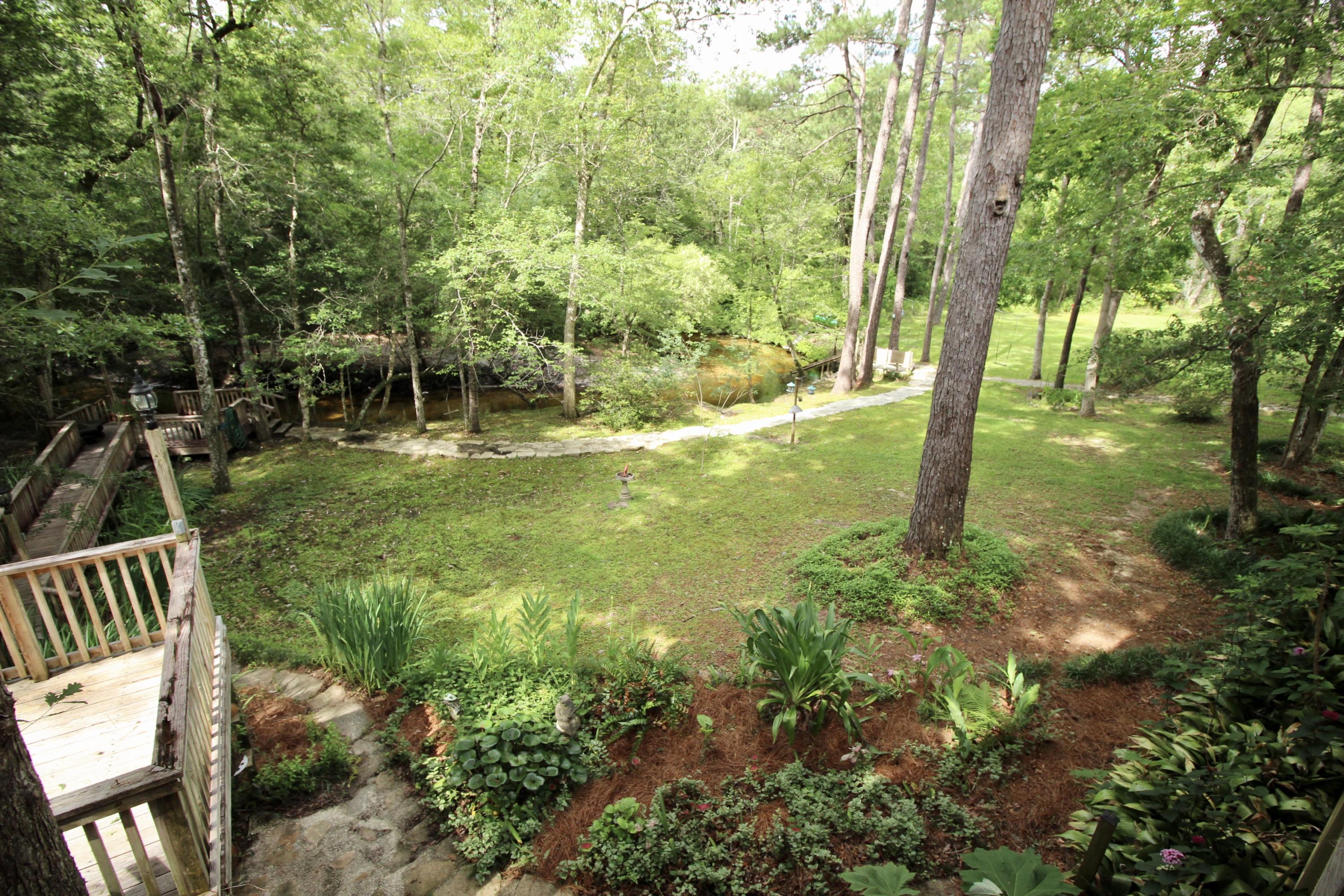 180 Tim Boland Road DeFuniak Springs, FL 32435 - Photo 23 of 85 a view of yard with green space