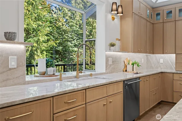 a kitchen with a sink and a window