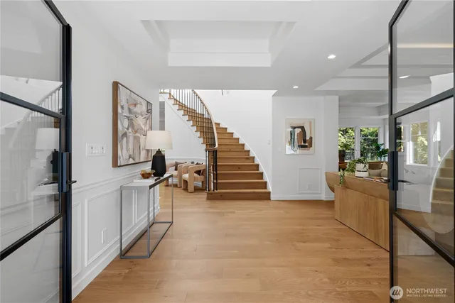a view of entryway and kitchen
