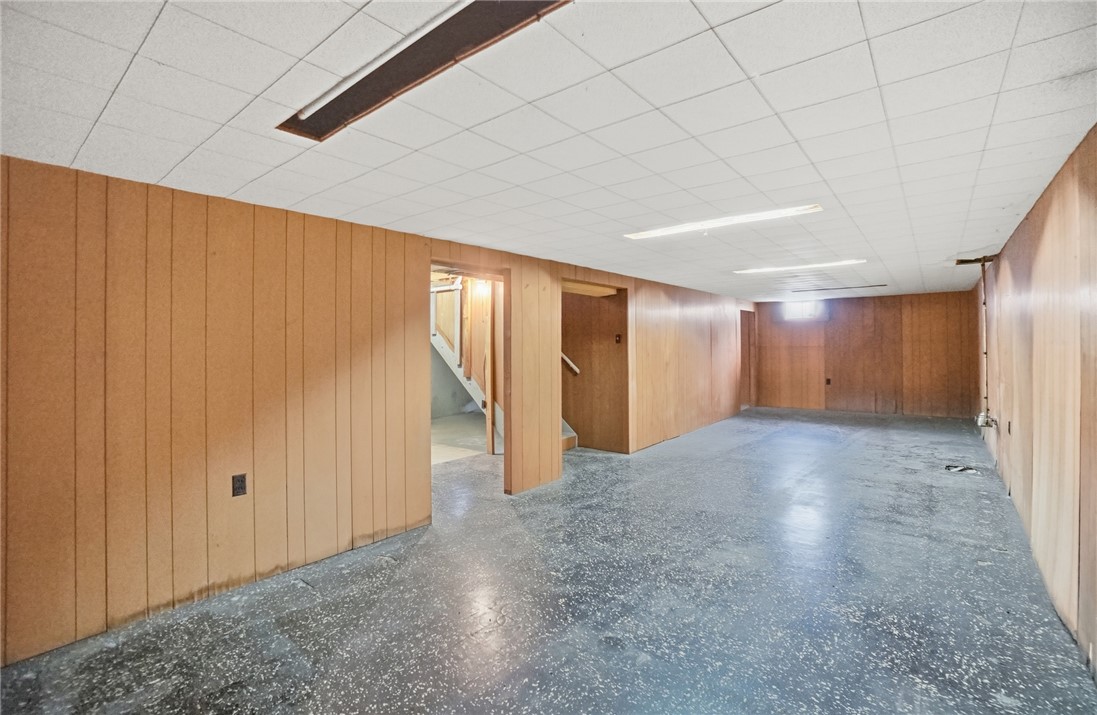 1087 Fairfield Road Troy, OH 45373 - Photo 24 of 39 This spacious basement offers ample room for future customization and features convenient interior stairs.