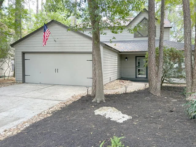 a kitchen with a sink stove and microwave