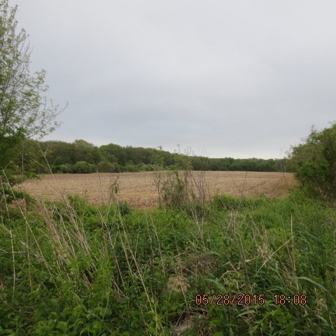 978 Sodom Road Westport, MA 02790 - Photo 3 of 9 a view of a lake with houses in the back