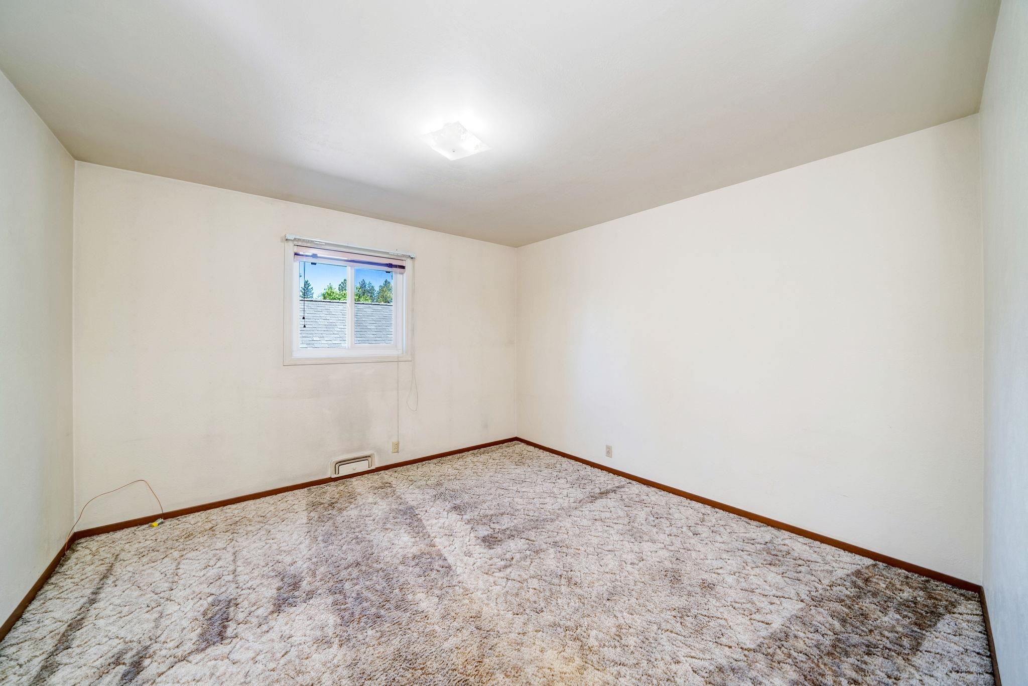 485 Ridge Street Portola, CA 96122 - Photo 13 of 27 an empty room with a workbench