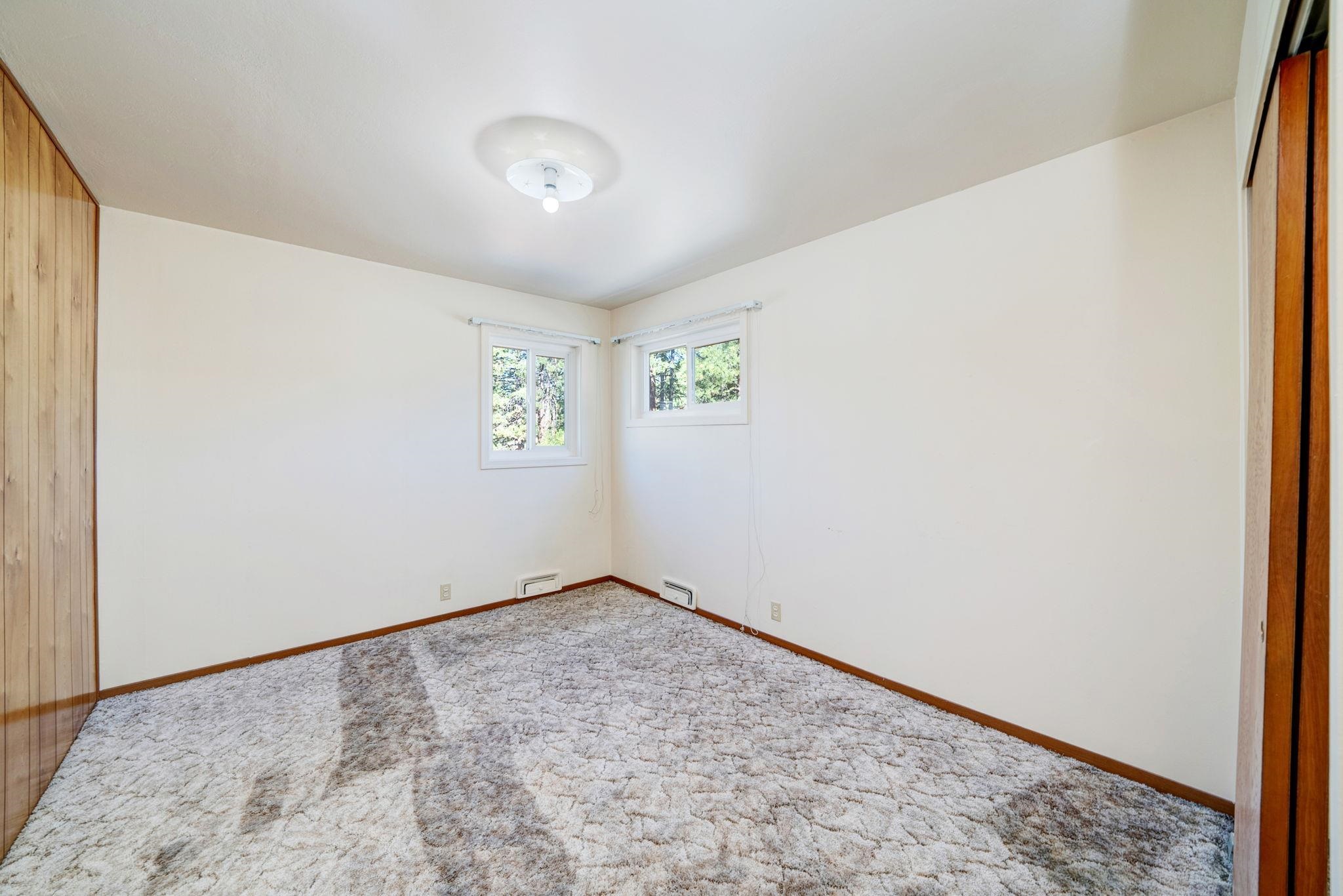 485 Ridge Street Portola, CA 96122 - Photo 15 of 27 an empty room with a window