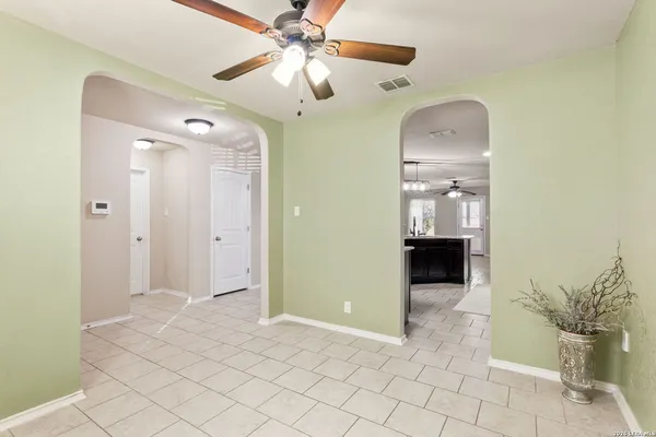 a view of a hallway with a bathroom