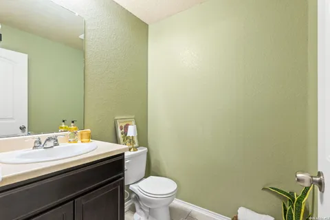 a bathroom with a sink and a toilet