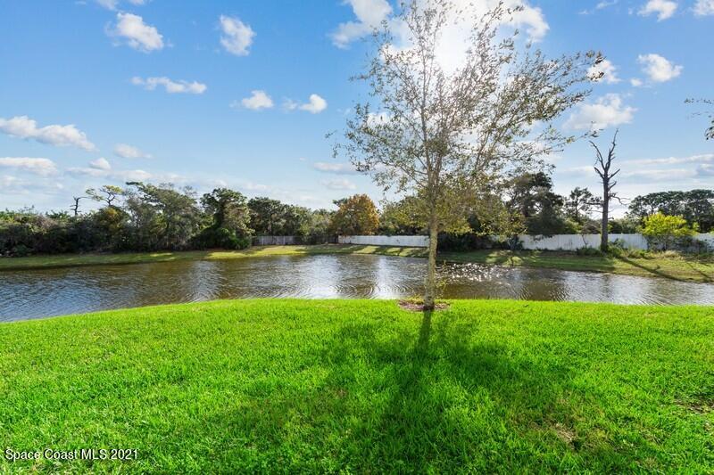 Undisclosed Address Melbourne, FL 32935 - Photo 14 of 17 14_2725RevolutionSt_101_26_BackYard_Flex