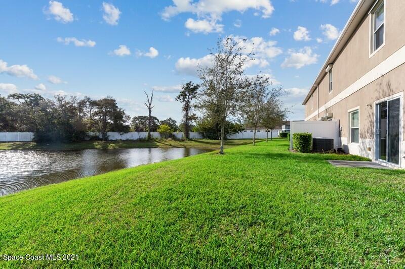 Undisclosed Address Melbourne, FL 32935 - Photo 15 of 17 15_2725RevolutionSt_101_26002_BackYard_F