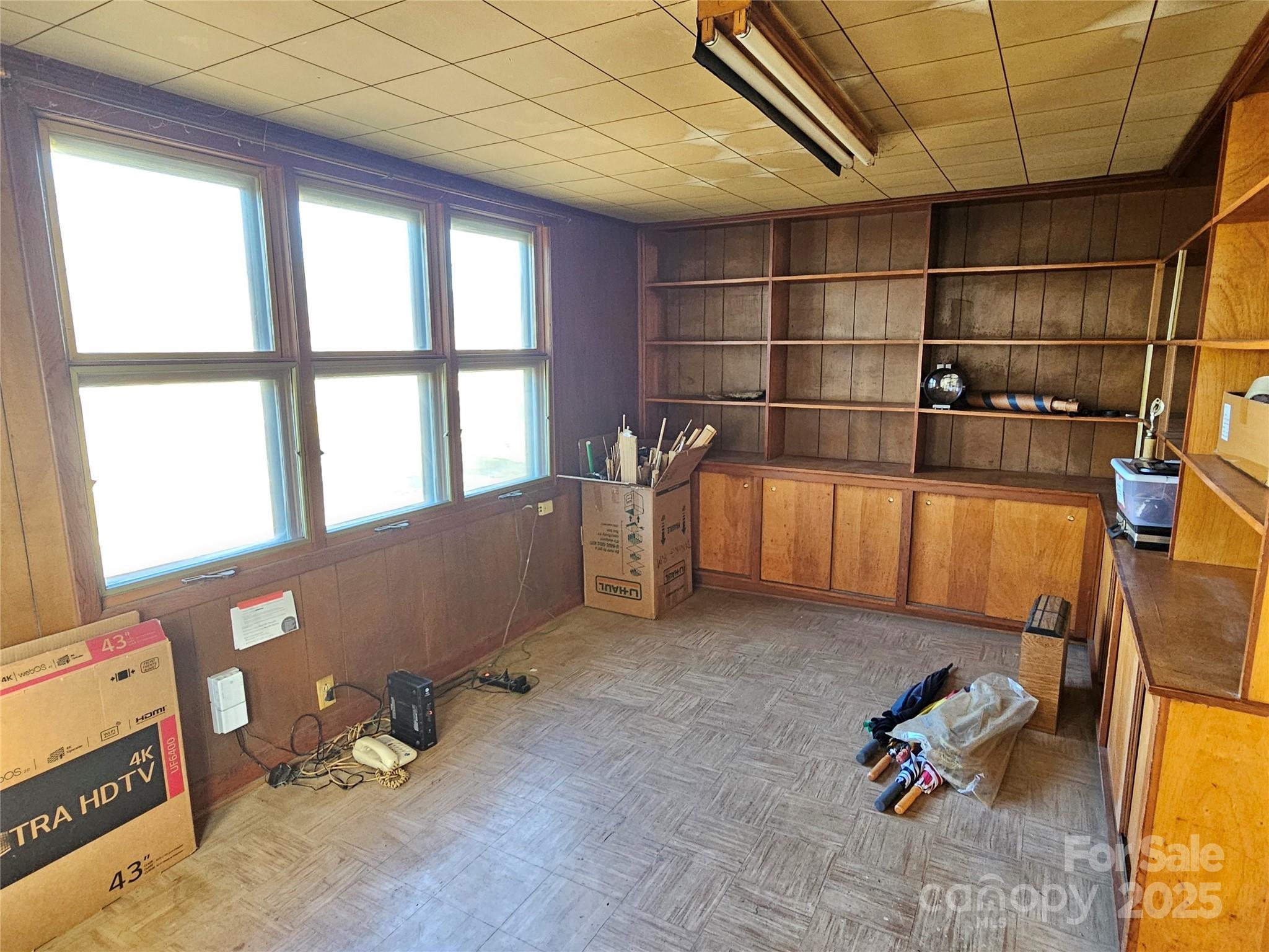 101 Edgewood Avenue Morganton, NC 28655 - Photo 11 of 32 a room with gym equipment and a large window