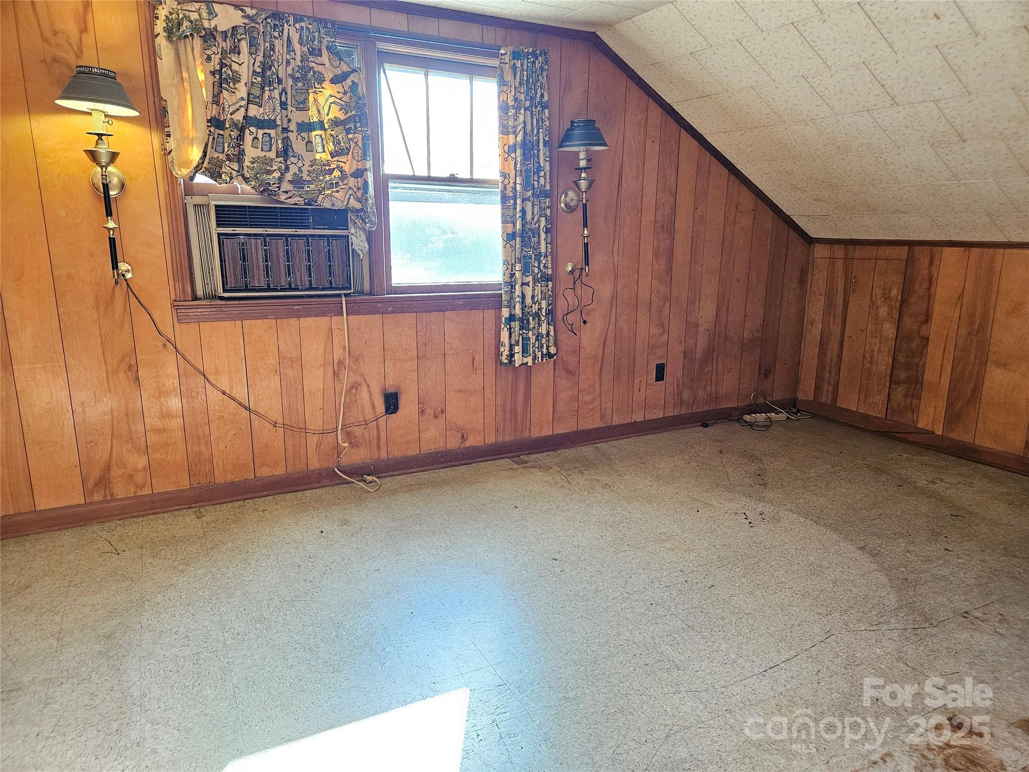 101 Edgewood Avenue Morganton, NC 28655 - Photo 21 of 32 a view of a room with wooden walls and window