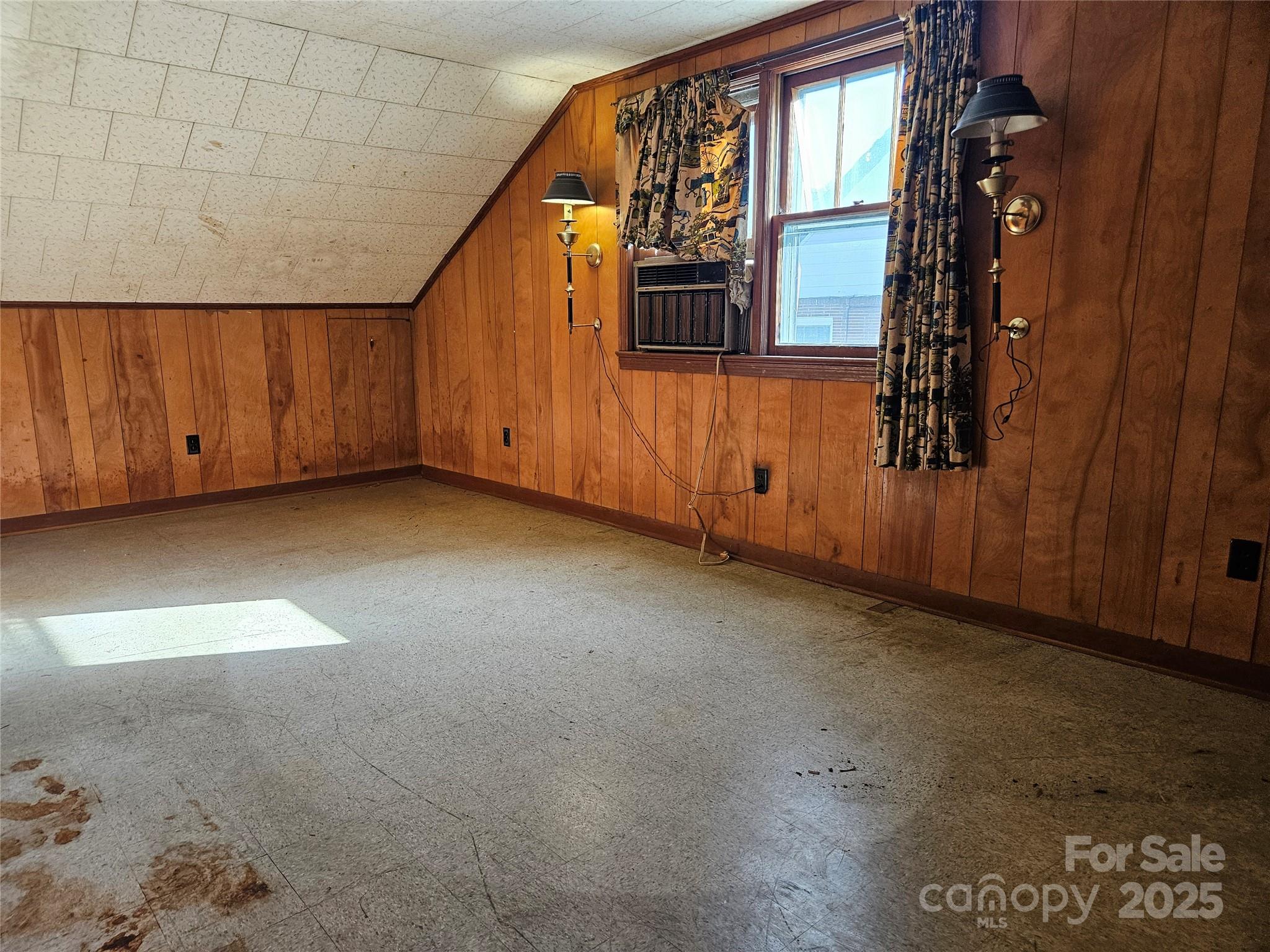 101 Edgewood Avenue Morganton, NC 28655 - Photo 22 of 32 a view of an empty room with a window