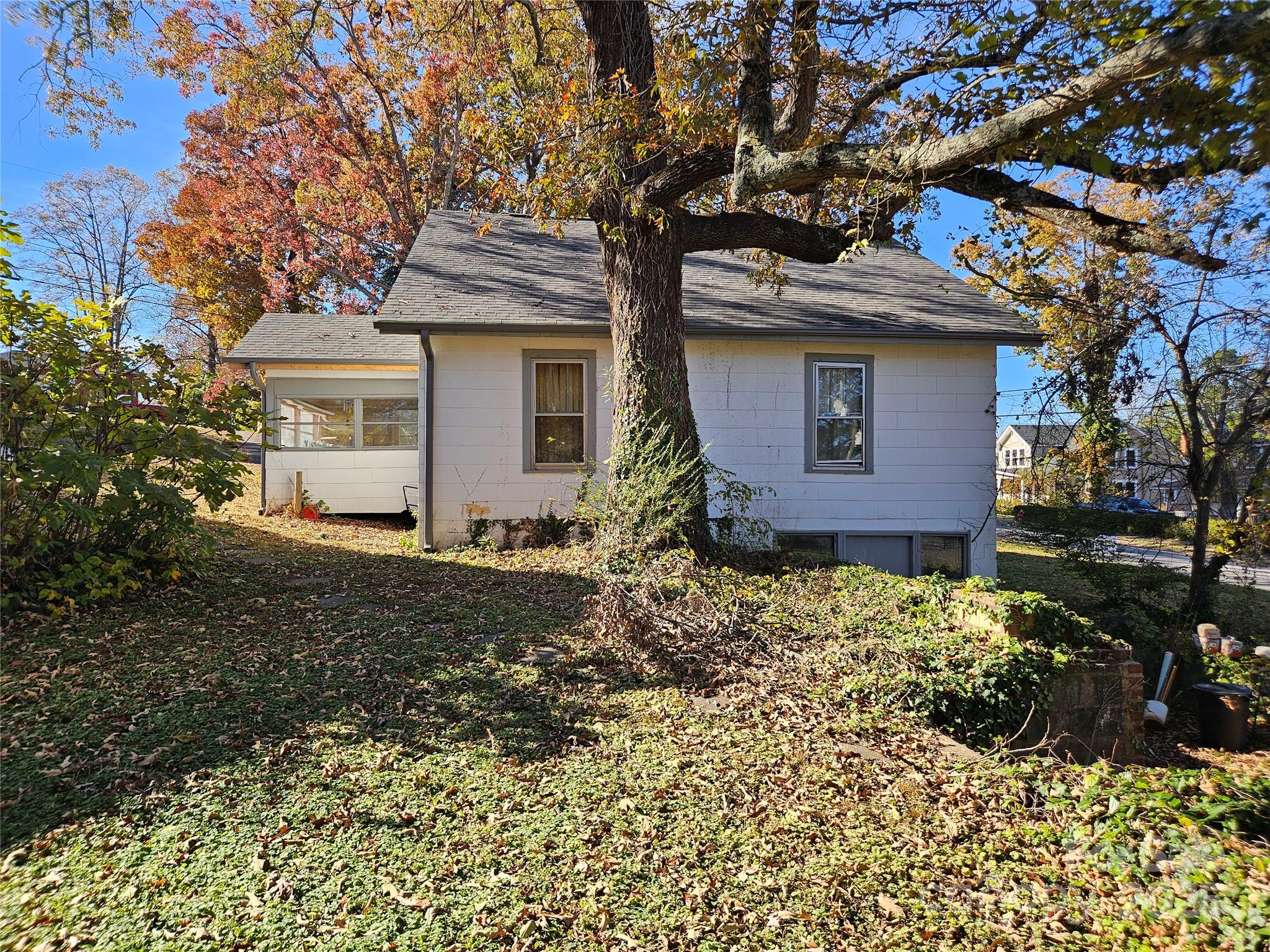 101 Edgewood Avenue Morganton, NC 28655 - Photo 5 of 32 a front view of a house with garden