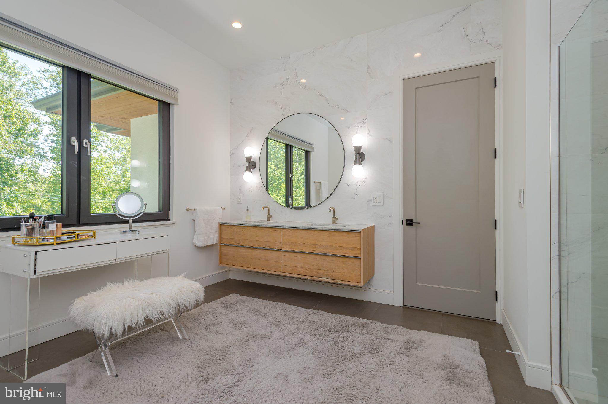 1267 Stuart Road Princeton, NJ 08540 - Photo 19 of 40 Sleek modern bathroom with natural light.