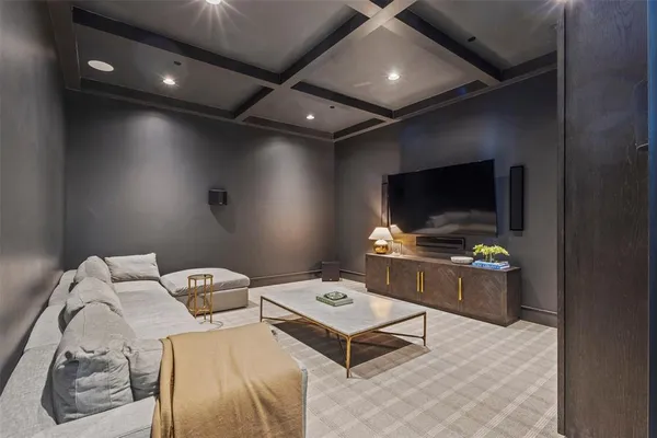 a living room with a flat screen tv and a couch