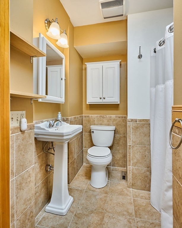 88 High Point Drive Amherst, MA 01002 - Photo 20 of 35 a bathroom with a sink toilet and shower