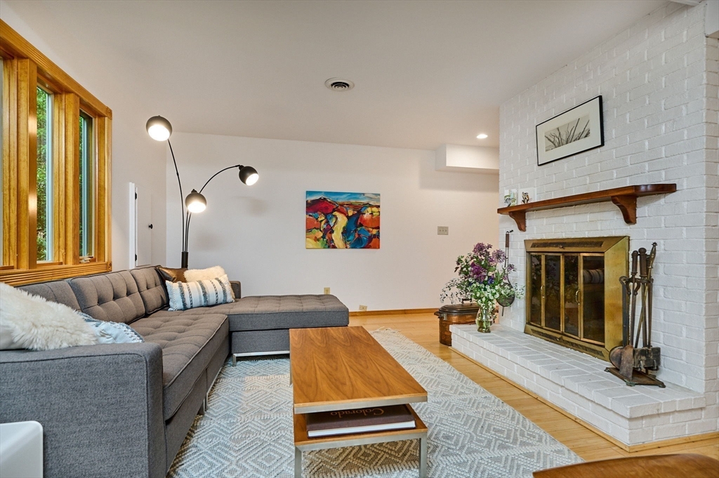 88 High Point Drive Amherst, MA 01002 - Photo 7 of 35 a living room with furniture and a fireplace