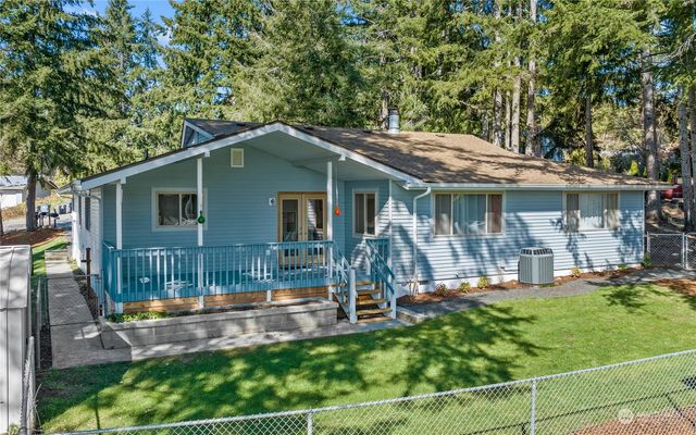a house view with a garden space