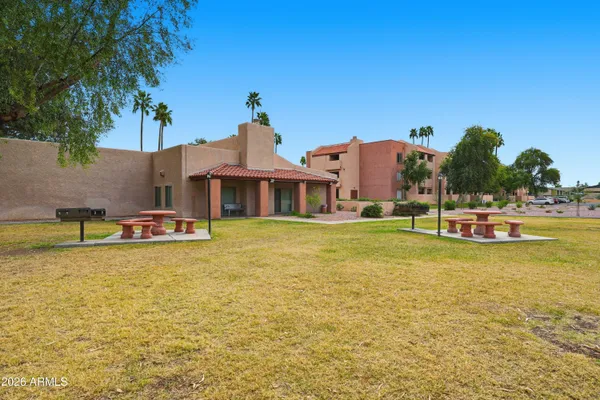 a front view of a house with swimming pool