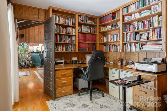 a view of a dining room with furniture and a livingroom