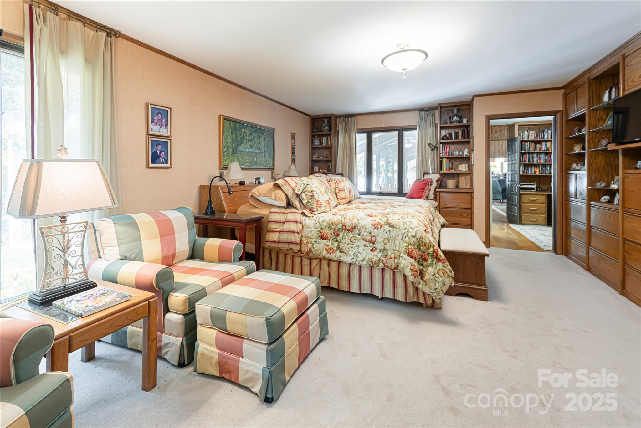 69 Forest Road Asheville, NC 28803 - Photo 18 of 48 a spacious bedroom with two beds and large window