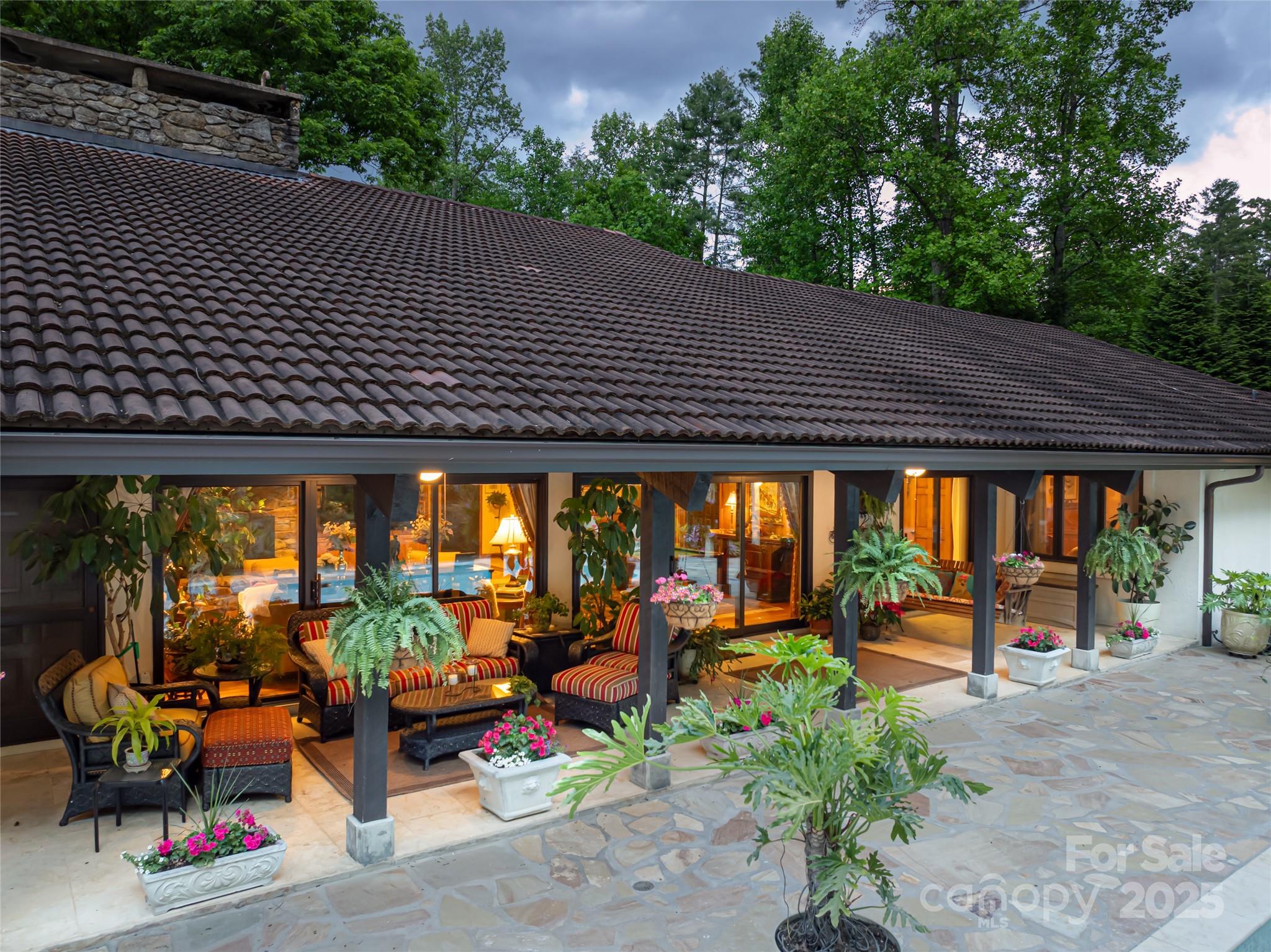 69 Forest Road Asheville, NC 28803 - Photo 24 of 48 an outdoor seating area with green space and furniture