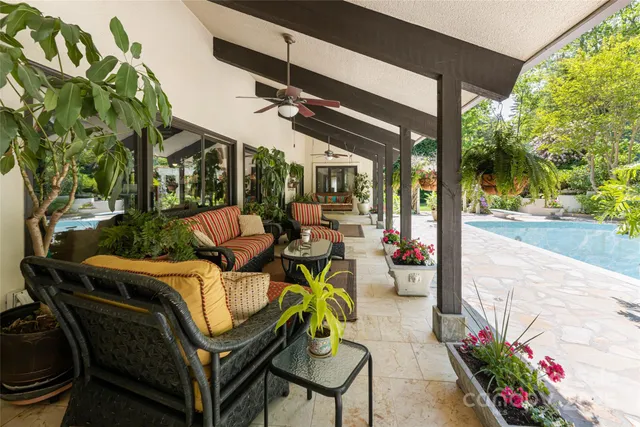 a view of a tables and chairs in patio